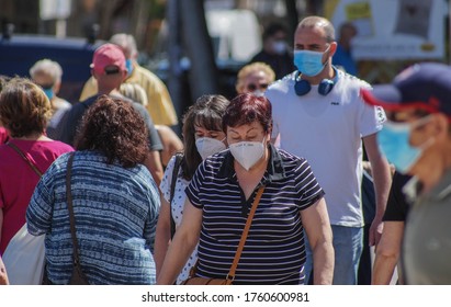 Madrid / Spain - 06/18/2020: Group Of People On The Street. New Situation In Spain About The Pandemic Of Covid-19. People Are Using Mask In Their New Life Routine. 