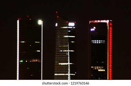 Madrid, Spain; 10 07 2018. 
Cuatro Torres Business Area (CTBA), Skyscrapers Of Madrid Illuminated At Night.