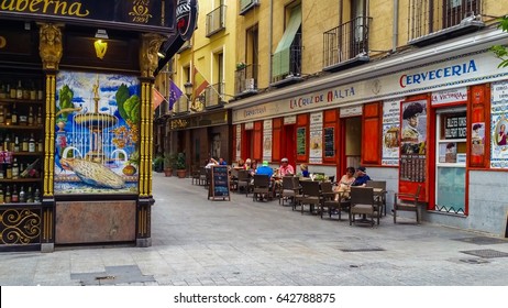 Madrid, Spain - 17 May 2017: Old Colorful Street With Decorative Wall Tiles And Terrace Restaurant In Central Madrid