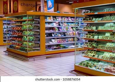 MADRID, SPAIN -  26 MARCH, 2018: Large Food Supermarket Auchan With Customers And Products And Staff.