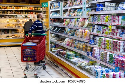 MADRID, SPAIN -  26 MARCH, 2018: Large Food Supermarket Auchan With Customers And Products And Staff.