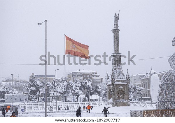Madrid, Spain - 9th January\
2021: During the weekend of January 9, 2021, the sky broke and\
covered the city of Madrid with a beautiful white color, never seen\
before!