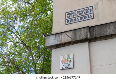 Madrid, Spain - April, 2022: A Picture Of The Museo Nacional Centro De Arte Reina Sofía Sign And The Calle De Santa Isabel Street Sign.