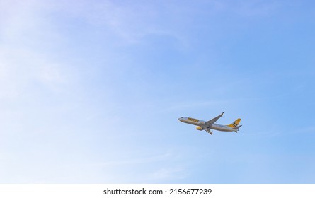 Madrid, Spain - April, 2022: A Picture Of A Buzz Plane Taking Off From An Airport.