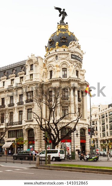 MADRID, SPAIN - APRIL 26: Building at
crossing the Calle de Alcala and Gran Via in April 26, 2013 in
Madrid, Spain.  It is most important avenues at
city
