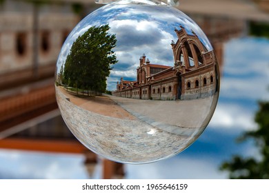 Madrid, Spain- April 30, 2021: Reflection In A Glass Ball Of The Slaughterhouse Building In Madrid.  Livestock Buildings.  Madrid Slaughterhouse