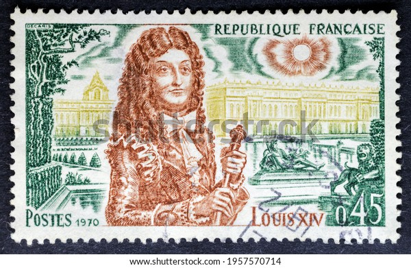 MADRID, SPAIN - APRIL 4, 2021. Vintage stamp printed in France shows Louis XIV (1637-1715), Louis the Great or the Sun King, king of France