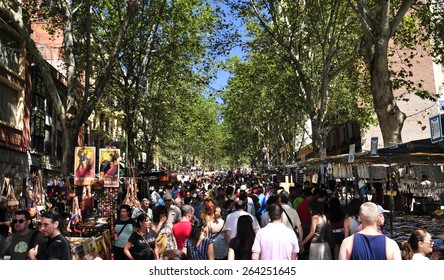 MADRID, SPAIN - AUGUST 10: Overlook of El Rastro flea market on August 10, 2014 in Madrid, Spain. This popular open air flea market is held every Sunday and public holiday