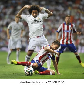 MADRID, SPAIN - August 19th, 2014 : Brazilian MARCELO VIEIRA Of Real Madrid And GABI Of Atletico De Madrid In Action During Spanish Supercopa Match At Santiago Bernabeu Stadium. 