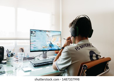 Madrid, Spain - August 23, 2019: Teenager Playing Counter Strike Global Offensive Video Game On PC. CSGO Is An Online Multiplayer Video Game Developed By Valve