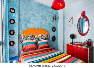 Madrid, Spain. Circa September 2017. Vintage Bedroom With A 60s Clock, Desk, Records,mirror, Colorful Bedcover And Retro Lamp