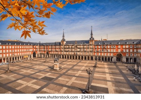 Madrid Spain, city skyline at Plaza Mayor with autumn leaf foliage