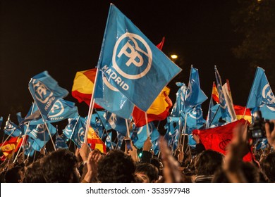 Madrid, Spain - December 20, 2015 - People With Conservative And National Flags Celebrating General Election Results In Madrid, Spain