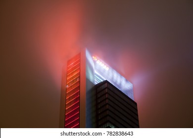 Madrid, Spain - December 25, 2017: Skyscraper At Night With Haze And Lighting Style Of The Movie Blade Runner
