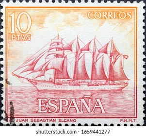 MADRID, SPAIN - FEBRUARY 1, 2020. Vintage Stamp Printed In Spain Shows Spanish Ship Juan Sebastián Elcano,  A Training Ship For The Royal Spanish Navy