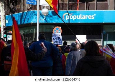 Madrid, Spain. February, 20, 2022. Protesters at conservative Popular Party, PP, headquarter against Pablo Casado, leader of PP and candidate for prime minister and supporting opponent Isabel Ayuso