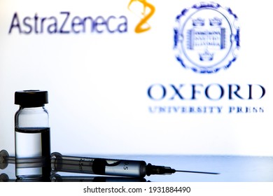 Madrid, Spain- February 23, 2021: Syringe And Vial With Covid-19 Vaccine . Astrazeneca And Oxford University Logo On White Background.