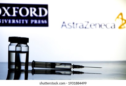 Madrid, Spain- February 23, 2021: Syringe And Vial With Covid-19 Vaccine . Astrazeneca And Oxford University Logo On White Background.