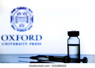 Madrid, Spain- February 23, 2021: Syringe And Vial With Covid-19 Vaccine And Oxford University Logo On White Background.