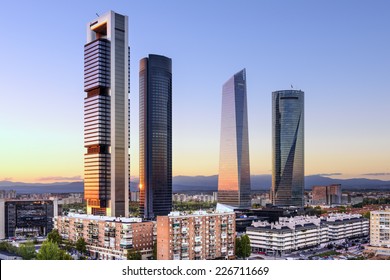 Madrid, Spain Financial District Skyline At Dusk.