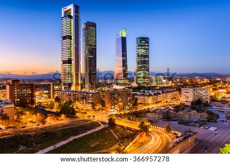 Madrid, Spain financial district skyline at twilight.