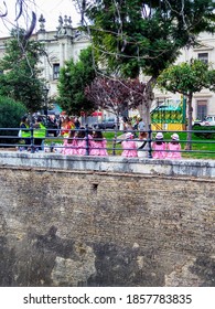 Madrid, Spain - Jan 5, 2018: A Group Of Children In Traditional Pink Clothes During The Three Kings Day