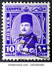 MADRID, SPAIN - JANUARY 12, 2022. Vintage Stamp Printed In Egypt Shows King Farouk Of Egypt (1920 - 1965), The Tenth Ruler Of Egypt From The Muhammad Ali Dynasty