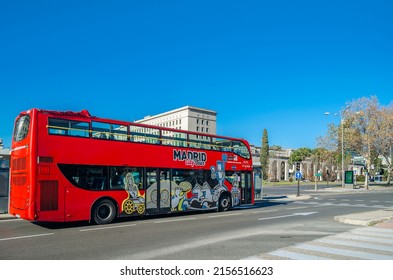 MADRID, SPAIN - JANUARY 12, 2022: Tourist bus on Paseo de la Castellana in Madrid, Spain