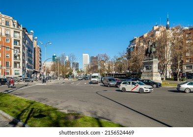 MADRID, SPAIN - JANUARY 12, 2022: Urban scene, view of Paseo de la Castellana, a major street in Madrid, Spain, cutting across the city from south to north