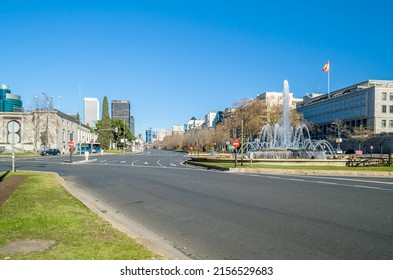 MADRID, SPAIN - JANUARY 12, 2022: Urban scene, view of Paseo de la Castellana in the Nuevos Ministeios area. Paseo de la Castellana is a major street in Madrid, Spain