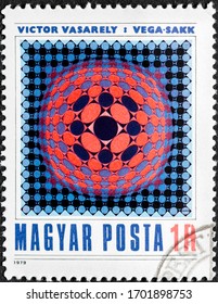 MADRID, SPAIN - JANUARY 18, 2020. Vintage stamp printed in Hungary shows image of Vega-Chess by Victor Vasarely, a Hungarian-French artist, leader of the op art movement