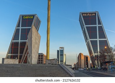 MADRID, SPAIN - JANUARY 23, 2018:  Sunrise view of Gate of Europe and Obelisk of Calatrava at Paseo de la Castellana street in City of Madrid, Spain