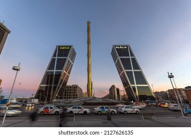 MADRID, SPAIN - JANUARY 23, 2018:  Sunrise view of Gate of Europe and Obelisk of Calatrava at Paseo de la Castellana street in City of Madrid, Spain