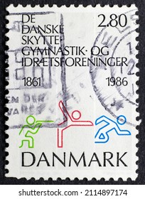 MADRID, SPAIN - JANUARY 30, 2022. Vintage stamp printed in Denmark shows Sports Pictograms, 125th Anniversary of Sport Societies