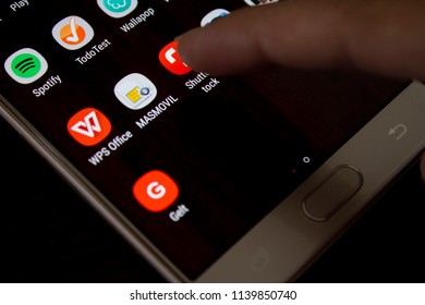 MADRID, SPAIN - JULY 22, 2018: Open with your finger on top of the Shutterstock application icon on a Samsung Gal ... - Shutterstock ID 1139850740