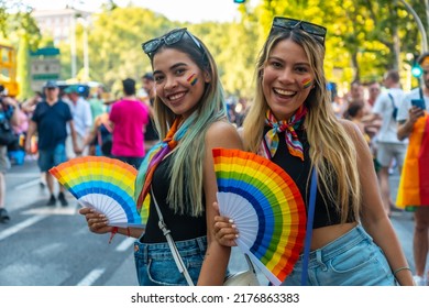 Madrid, Spain: July 9, 2022: A Couple Of Bisexual Girls Enjoying Themselves At The Gay Pride Party, Lgbt In Madrid