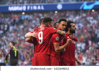MADRID, SPAIN - JUNE 1, 2019: Mohamed Salah of Liverpool celebrates with Trent Alexander-Arnold of Liverpool after he scored during the 2018/19 UEFA Champions League Final.