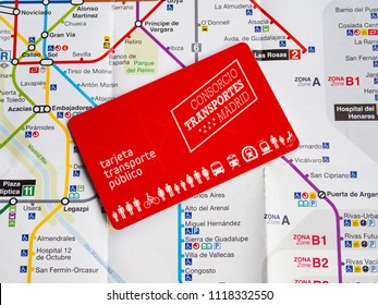 Madrid - Spain, June 19 - 2018  Public transport card of Madrid on underground map of Madrid