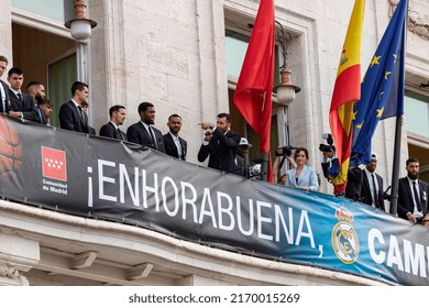 MADRID, SPAIN - JUNE 20, 2022. Real Madrid. Celebration. Celebration Of The Madrid Basketball Team In The League Cup. Players Like Rudy Fernández Or Sergio Llull Leaning Out On The Balcony.