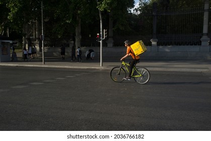 Madrid, Spain - June 28th, 2020: Food Delivery Biker By Madrid Downtown