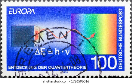 MADRID, SPAIN - MARCH 1, 2020. Vintage Stamp Printed In Germany Shows Blackbody Radiation, Discovery Of Quantum Theory, By Max Planck, A German Theoretical Physicist, Nobel Prize In Physics In 1918