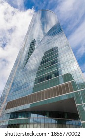 MADRID, SPAIN - MARCH 11, 2013: Skyscraper Torre Espacio And Flags. Building Was Constructed In 2007 And Designed By Architect Henry N. Cobb 