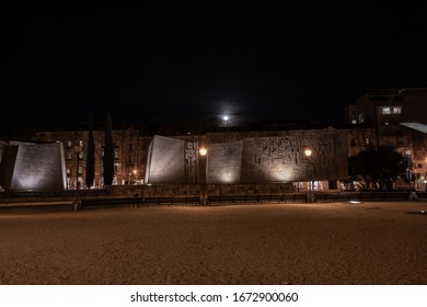 Madrid / Spain - March 2020: Plaza De Colón In Madrid, Spain In A Beautiful Dark Night With All The Lights Of The Sculptures And Reflection Of The Water