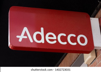 MADRID, SPAIN - MAY 19, 2019. Adecco Logo On Addeco Office.  Adecco Is The Largest Temp Staffing Firm In The World