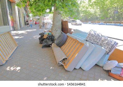 MADRID SPAIN - MAY 27, 2019: Hard Rubbish On Street Madrid Spain