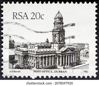 MADRID, SPAIN - NOVEMBER 21, 2021. Vintage Stamp Printed In South Africa Shows Post Office, Durban