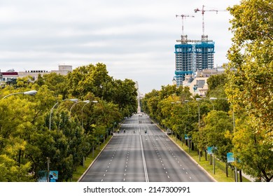 Madrid, Spain - October 10, 2021: High angle view Paseo de la Castellana in Madrid with no traffic. Cityscape of the downtown of the city