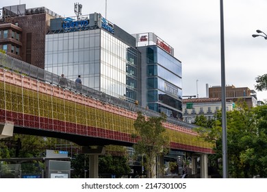 Madrid, Spain - October 10, 2021: Juan Bravo overpass over Paseo de la Castellana in the downtown of Madrid. It is decorated with Spanish flag