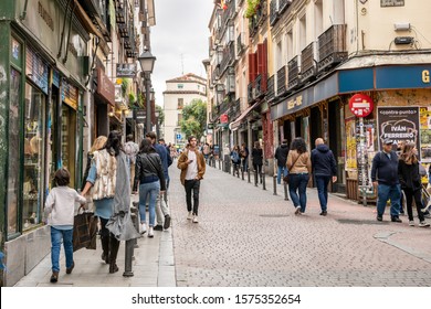 Madrid / Spain - October 19, 2019: People Explore The Beautiful Back Streets Of The Trendy Malasana Neighborhood, Known For Vintage Shopping And Great Nightlife.