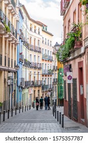 Madrid / Spain - October 19, 2019: People Explore The Beautiful Back Streets Of The Trendy Lavapies Neighborhood, Known For Vintage Shopping And Great Nightlife.